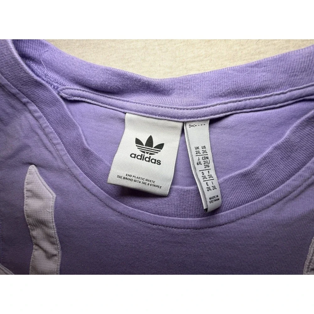 Adidas. size 2XL. Purple and Black retro style tshirt